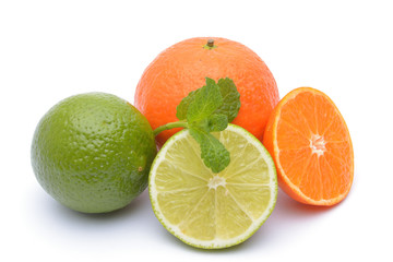 Limes and tangerines on white background