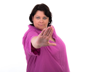 frau hält die hand zur abwehr