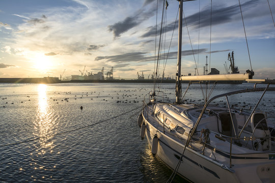 Fototapeta Yacht at sunset