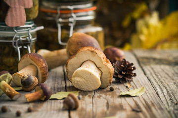 Preparation kitchen mushrooms marinated jars wooden table