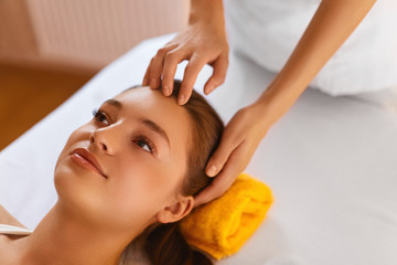 Naklejka premium Face spa. Woman during facial massage. Face treatment, skin care
