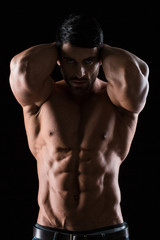 Fototapeta na wymiar Portrait of a strong muscular man