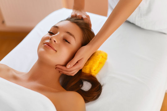 Face skin. Woman receiving facial spa treatment, massage.