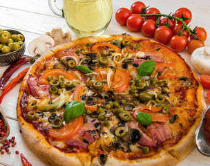 Pizza with ham and olives