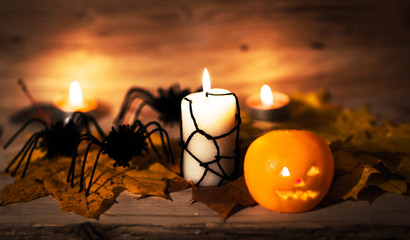 Halloween pumpkin head jack lantern on wooden background