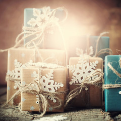 Fototapeta na wymiar Decor for Festive Boxes with Snowflakes, Beige, Blue Paper, Linen Cord