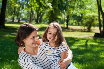 Naklejka premium Beautiful Mother and Daughter have Fun