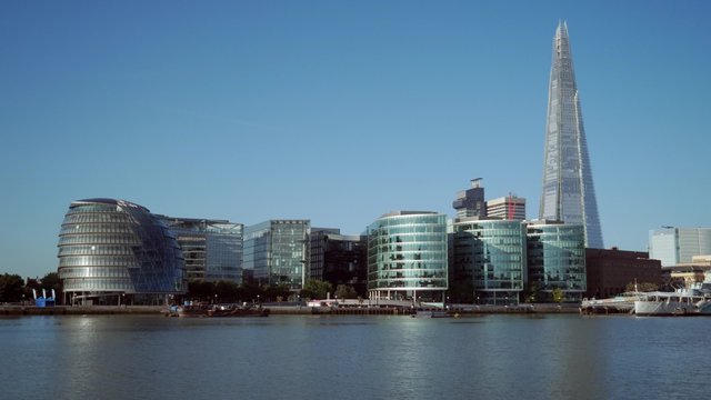 View of the Shard and City Hall on the South Bank of the River Thames. Taken from The Tower of London on a sunny autumn day and in 4K 