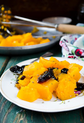 Baked pumpkin with spices and blackcurrent jam