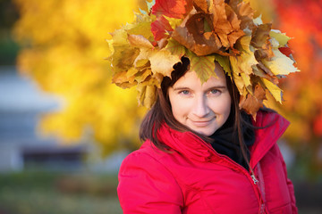 Woman with a wreath of maple leaves