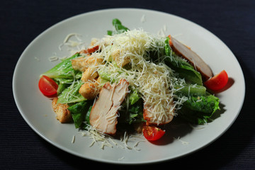 portion served in a restaurant decorated with lettuce