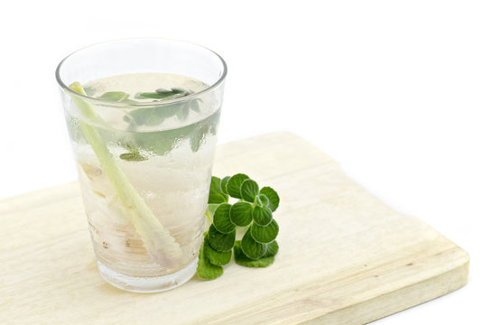 cold soda drink with lemon grass, lychee.mint on wood tray isolated white background