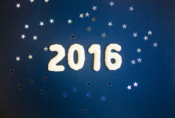 2016 als Grußkarte. Sterne und Kekse fürs neue Jahr. Europäische Union oder als dunkleblaue Nacht.