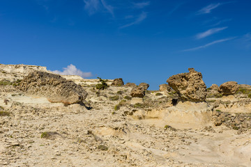 Fototapeta na wymiar Picturesque mountains and rocks of unusual bizarre in Sarakiniko, Milos, Cyclades, Greece.