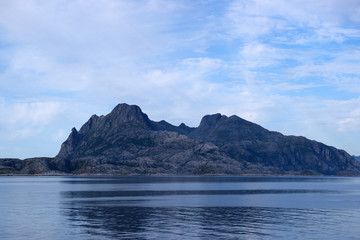 Misty mountain coast near Bodo viewed from ferry to Lofoten, Nor