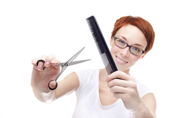 Red head professional hairdresser woman with scissors