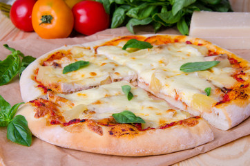 Pizza with chicken and pineapple