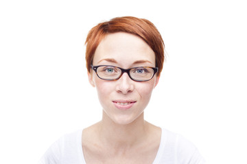 Obraz premium Smiling red head woman on white background