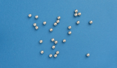 Steel balls on blue background