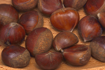 Chestnuts on wooden background