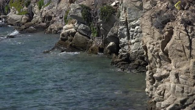 Mykonos Greece coastal cliff ocean waves 4K 147