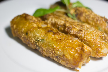 Nem - homemade spring rolls with chili sauce and fresh coriander - vietnamese cuisine
