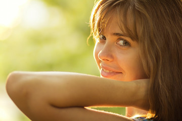 portrait of a beautiful young woman in sunlight