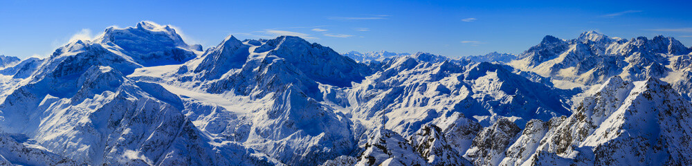 Panorama of Snow Mountain Range. Landscape with Blue Sky at Mt Fort Peak Alps Region Switzerland