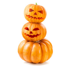 Halloween pumpkin head jack lantern with burning candles isolated on white background