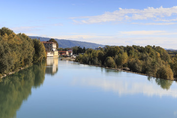 Fototapeta na wymiar Dora Baltea River and Ivrea cityscape in Piedmont, Italy