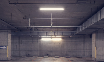 Empty space underground car parking lot at business building