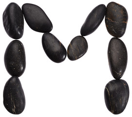 Alphabet from stones. Letter M