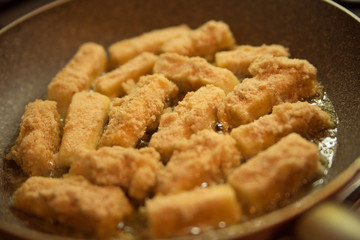 breaded cheese on a pan
