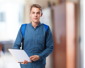 happy student man with a notebook