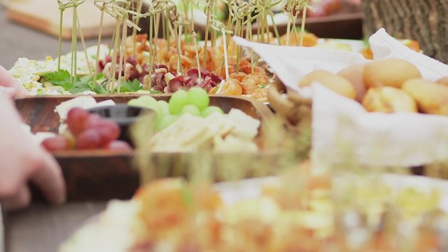 The waiter serves food 