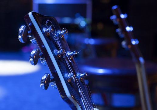 Guitar and other musical equipment on stage before concert