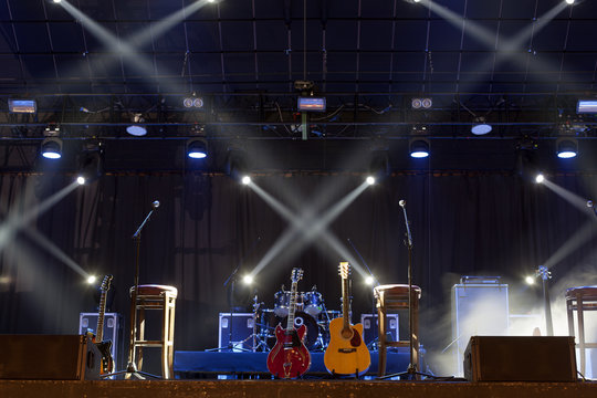 Guitar and other musical equipment on stage before concert