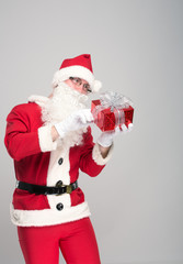 Portrait of happy Santa Claus with a huge sack