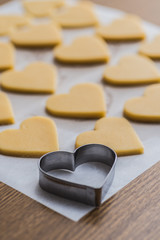 Obraz na płótnie Canvas Baking homemade butter cookies, heart shape