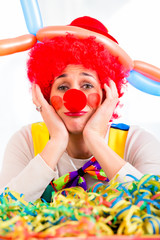 Sad clown being sick and tired of it all