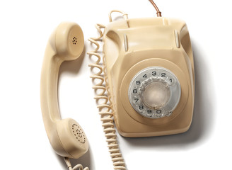 Retro yellow phone isolated on white background