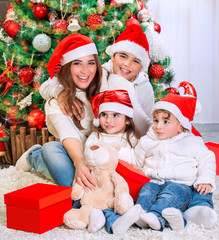 Happy family in Christmas eve