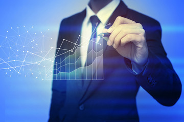 Closeup image of businessman drawing  graph,business strategy as