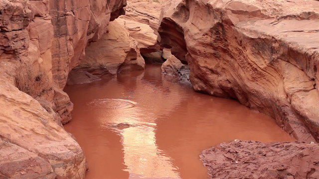 Water splash flooded colorful slot canyon southern Utah slow HD 1621