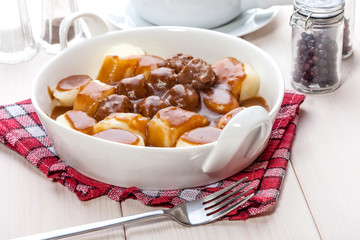 Potato dumplings with meat meatballs.