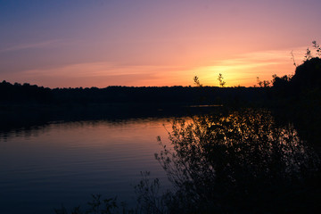 Obraz premium Beautiful Lake With Colorful Sunset Sky