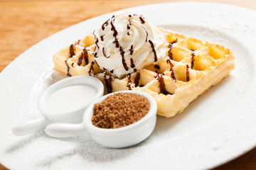 Belgian waffel with cream chocolat sauce and sugar