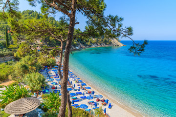 A view of Lemonakia beach with turquoise sea water, Samos island, Greece - obrazy, fototapety, plakaty