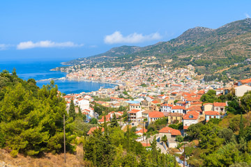 Fototapeta na wymiar A view of Samos town which is located in beautiful bay on coast of Samos island, Greece