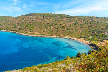 Fototapeta na wymiar Idyllic bay with beautiful beach on coast of Samos island, Greece
